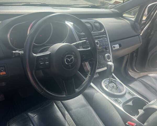 Серый Мазда СХ-7, объемом двигателя 2.26 л и пробегом 160 тыс. км за 7500 $, фото 5 на Automoto.ua