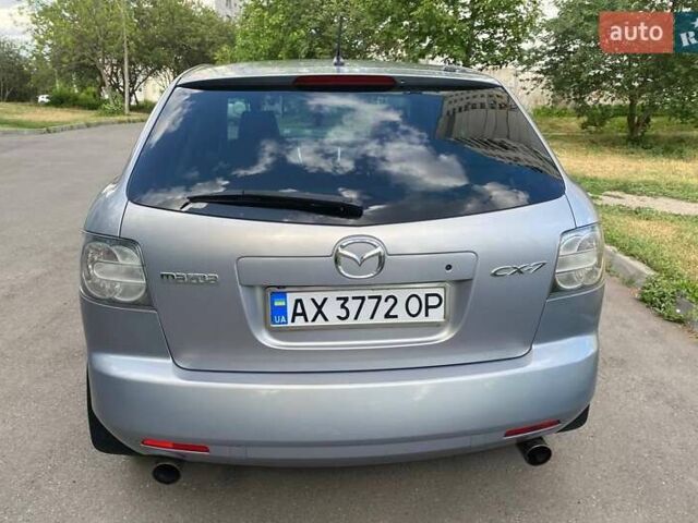 Серый Мазда СХ-7, объемом двигателя 2.26 л и пробегом 182 тыс. км за 6800 $, фото 4 на Automoto.ua