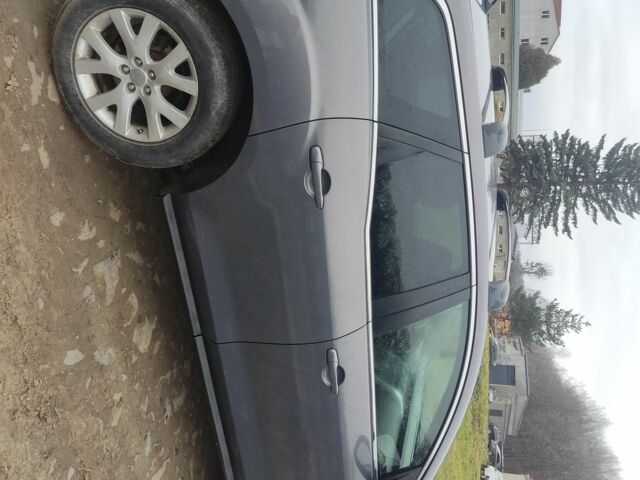 Серый Мазда СХ-7, объемом двигателя 2.3 л и пробегом 235 тыс. км за 7777 $, фото 3 на Automoto.ua