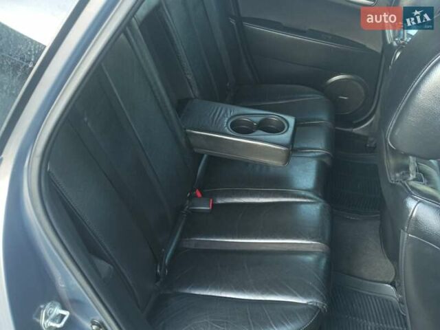 Серый Мазда СХ-7, объемом двигателя 2.26 л и пробегом 240 тыс. км за 5800 $, фото 18 на Automoto.ua