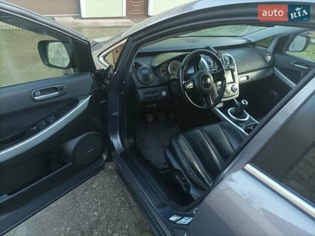 Серый Мазда СХ-7, объемом двигателя 2.26 л и пробегом 240 тыс. км за 5800 $, фото 12 на Automoto.ua