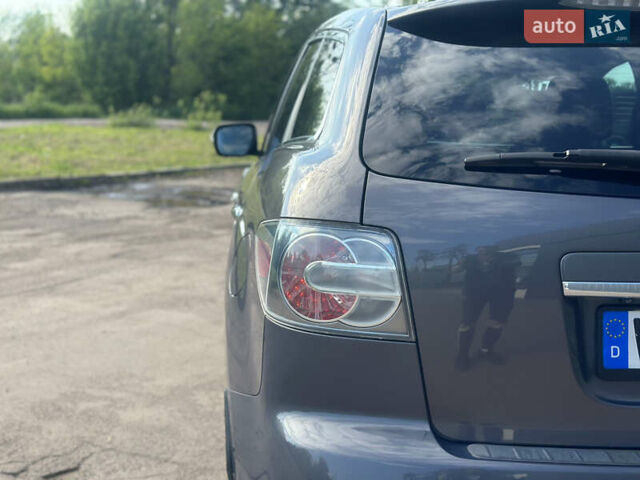 Серый Мазда СХ-7, объемом двигателя 2.2 л и пробегом 189 тыс. км за 8800 $, фото 23 на Automoto.ua