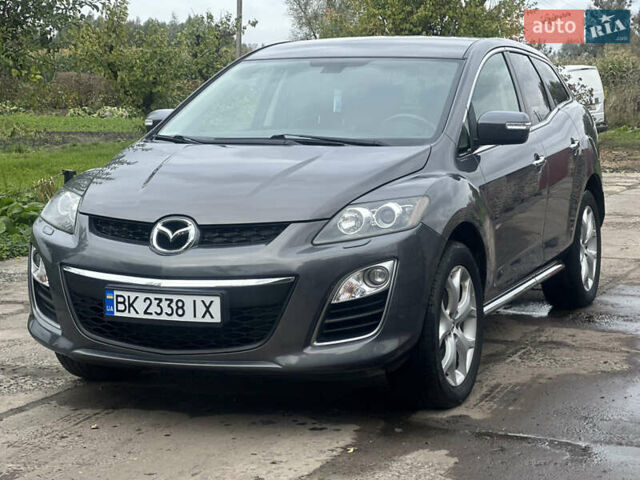 Серый Мазда СХ-7, объемом двигателя 2.2 л и пробегом 189 тыс. км за 9500 $, фото 1 на Automoto.ua
