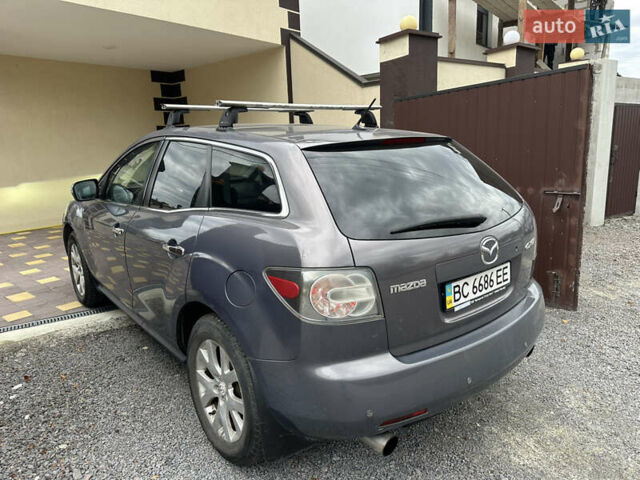 Серый Мазда СХ-7, объемом двигателя 2.3 л и пробегом 221 тыс. км за 6950 $, фото 4 на Automoto.ua