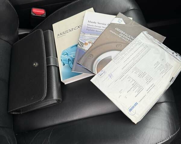 Серый Мазда СХ-7, объемом двигателя 2.2 л и пробегом 218 тыс. км за 9400 $, фото 26 на Automoto.ua