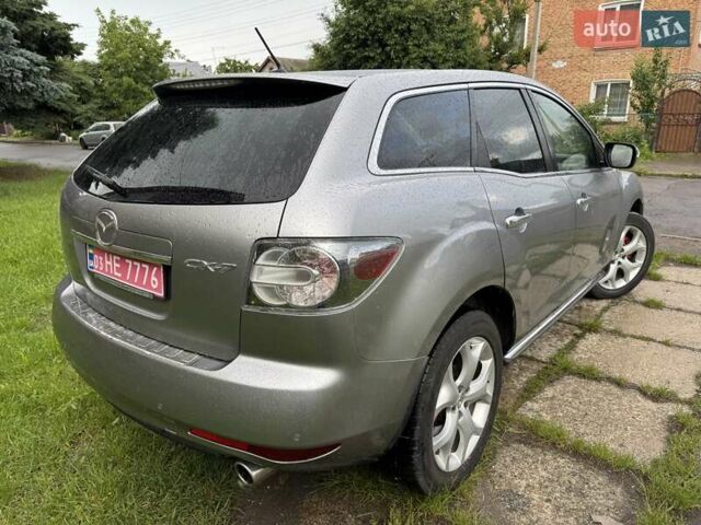 Серый Мазда СХ-7, объемом двигателя 2.2 л и пробегом 218 тыс. км за 9700 $, фото 4 на Automoto.ua