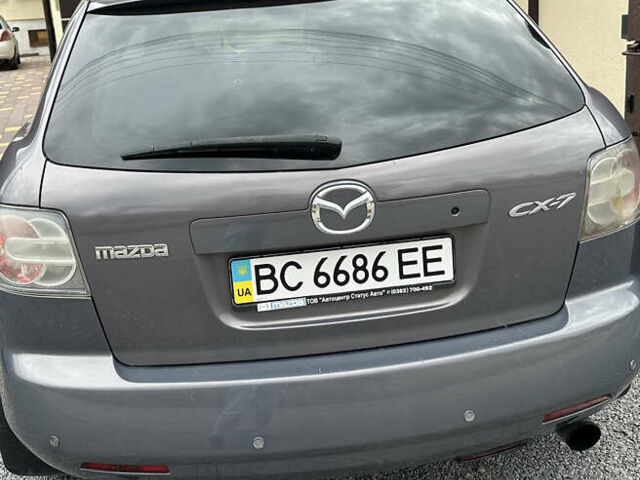 Серый Мазда СХ-7, объемом двигателя 2.3 л и пробегом 221 тыс. км за 6950 $, фото 5 на Automoto.ua