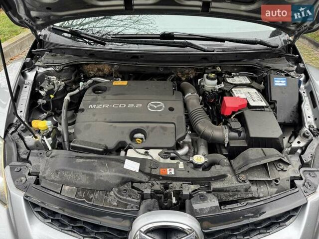 Серый Мазда СХ-7, объемом двигателя 2.2 л и пробегом 218 тыс. км за 9400 $, фото 12 на Automoto.ua