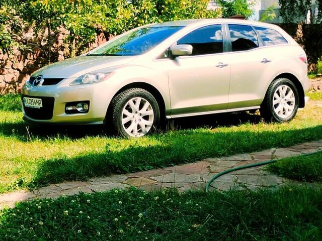 Серый Мазда СХ-7, объемом двигателя 2.3 л и пробегом 210 тыс. км за 6000 $, фото 1 на Automoto.ua