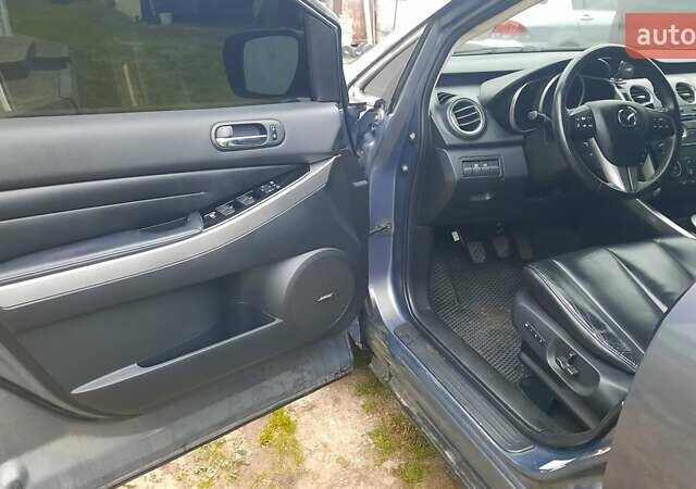 Серый Мазда СХ-7, объемом двигателя 2.2 л и пробегом 230 тыс. км за 8000 $, фото 3 на Automoto.ua