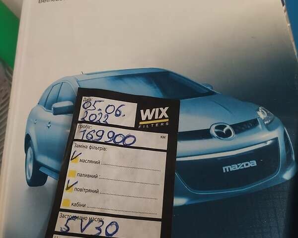 Сірий Мазда СХ-7, об'ємом двигуна 2.2 л та пробігом 176 тис. км за 10650 $, фото 10 на Automoto.ua