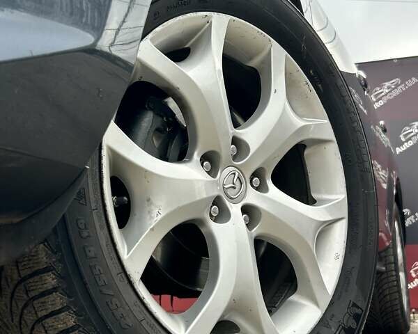 Серый Мазда СХ-7, объемом двигателя 2.18 л и пробегом 196 тыс. км за 9700 $, фото 5 на Automoto.ua