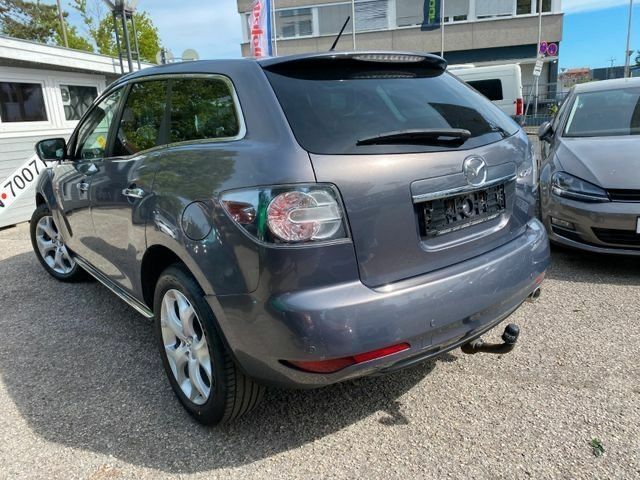 Серый Мазда СХ-7, объемом двигателя 2.2 л и пробегом 215 тыс. км за 6415 $, фото 2 на Automoto.ua