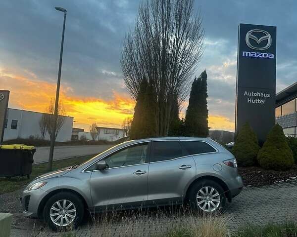 Серый Мазда СХ-7, объемом двигателя 2.5 л и пробегом 210 тыс. км за 8000 $, фото 1 на Automoto.ua