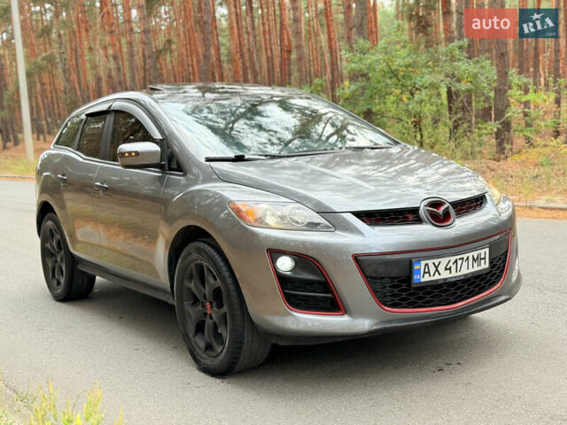 Серый Мазда СХ-7, объемом двигателя 2.26 л и пробегом 175 тыс. км за 7800 $, фото 31 на Automoto.ua