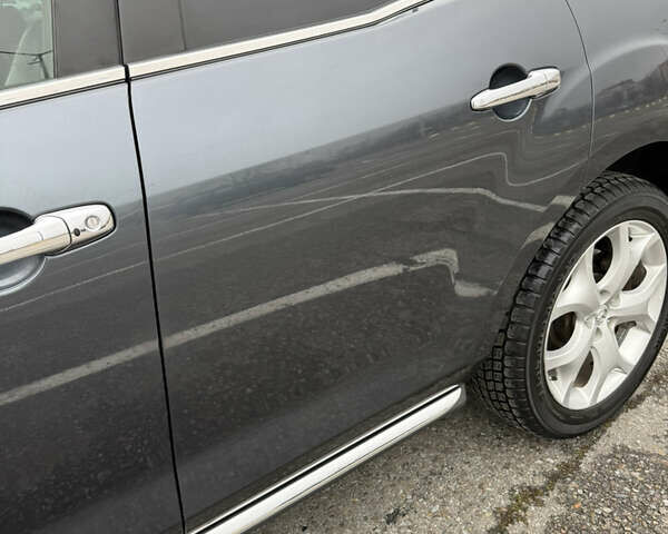 Серый Мазда СХ-7, объемом двигателя 2.2 л и пробегом 245 тыс. км за 9700 $, фото 6 на Automoto.ua