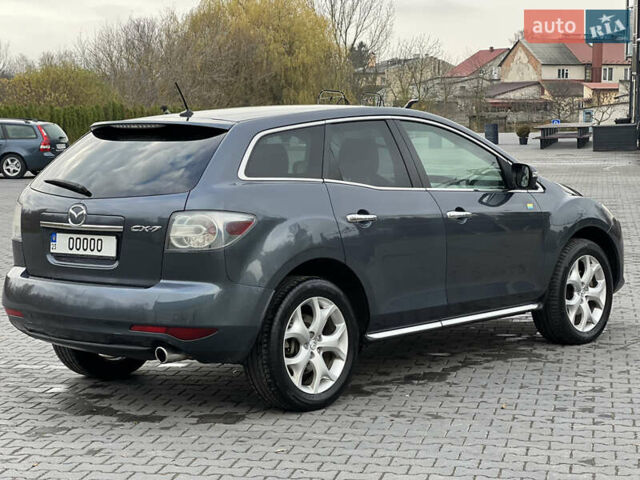 Серый Мазда СХ-7, объемом двигателя 2.18 л и пробегом 240 тыс. км за 11000 $, фото 18 на Automoto.ua