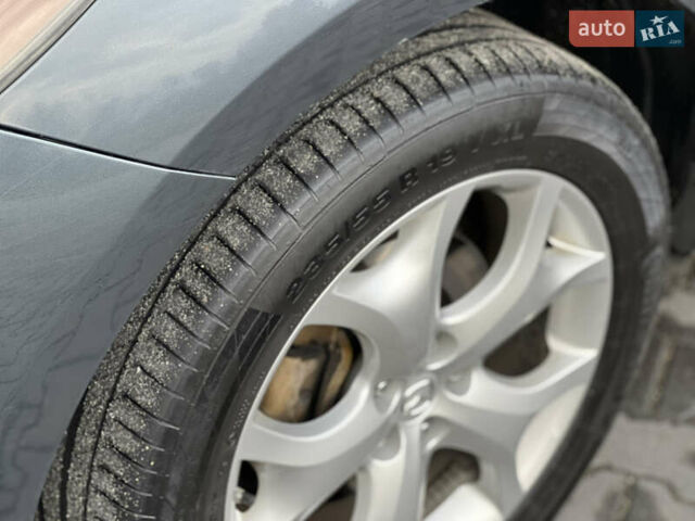Серый Мазда СХ-7, объемом двигателя 2.18 л и пробегом 240 тыс. км за 11000 $, фото 16 на Automoto.ua