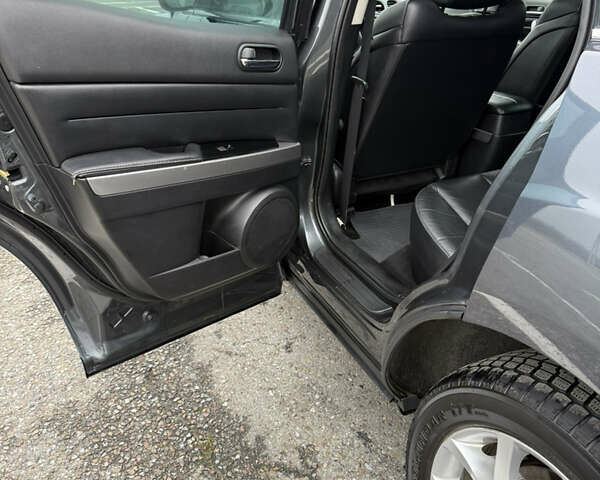 Серый Мазда СХ-7, объемом двигателя 2.2 л и пробегом 245 тыс. км за 9700 $, фото 26 на Automoto.ua