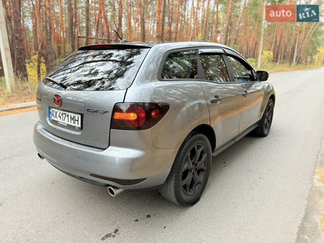 Серый Мазда СХ-7, объемом двигателя 2.26 л и пробегом 175 тыс. км за 7800 $, фото 27 на Automoto.ua