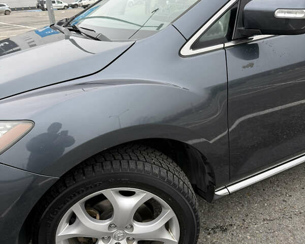 Серый Мазда СХ-7, объемом двигателя 2.2 л и пробегом 245 тыс. км за 9700 $, фото 3 на Automoto.ua