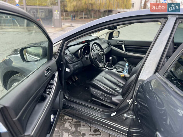 Серый Мазда СХ-7, объемом двигателя 2.18 л и пробегом 240 тыс. км за 11000 $, фото 13 на Automoto.ua