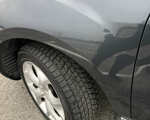 Серый Мазда СХ-7, объемом двигателя 2.2 л и пробегом 245 тыс. км за 9700 $, фото 4 на Automoto.ua