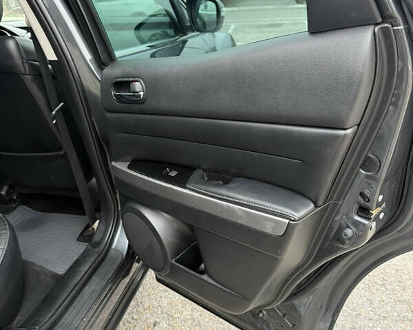 Серый Мазда СХ-7, объемом двигателя 2.2 л и пробегом 245 тыс. км за 9700 $, фото 25 на Automoto.ua