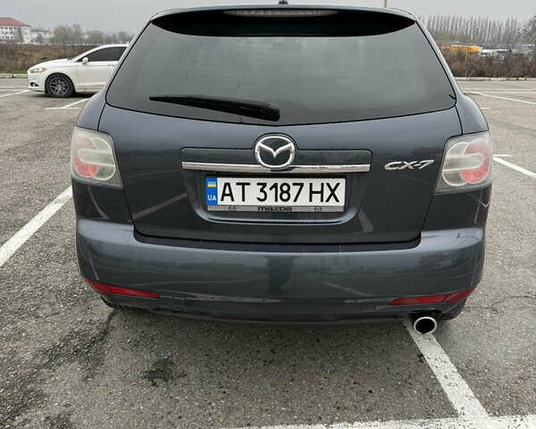 Серый Мазда СХ-7, объемом двигателя 2.2 л и пробегом 245 тыс. км за 9700 $, фото 9 на Automoto.ua