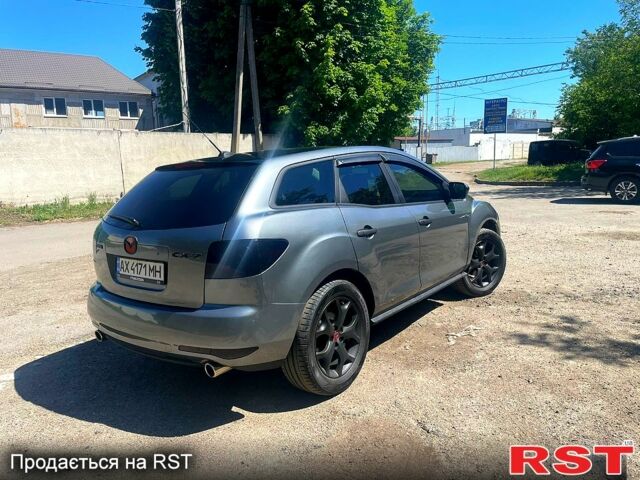 Сірий Мазда СХ-7, об'ємом двигуна 2.3 л та пробігом 137 тис. км за 6500 $, фото 5 на Automoto.ua