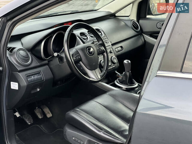 Серый Мазда СХ-7, объемом двигателя 2.18 л и пробегом 240 тыс. км за 11000 $, фото 5 на Automoto.ua