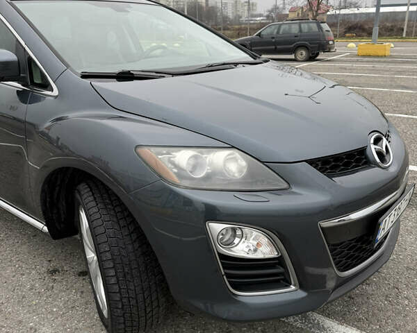 Серый Мазда СХ-7, объемом двигателя 2.2 л и пробегом 245 тыс. км за 9700 $, фото 17 на Automoto.ua