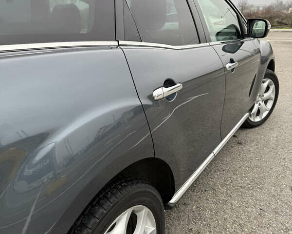 Серый Мазда СХ-7, объемом двигателя 2.2 л и пробегом 245 тыс. км за 9700 $, фото 12 на Automoto.ua