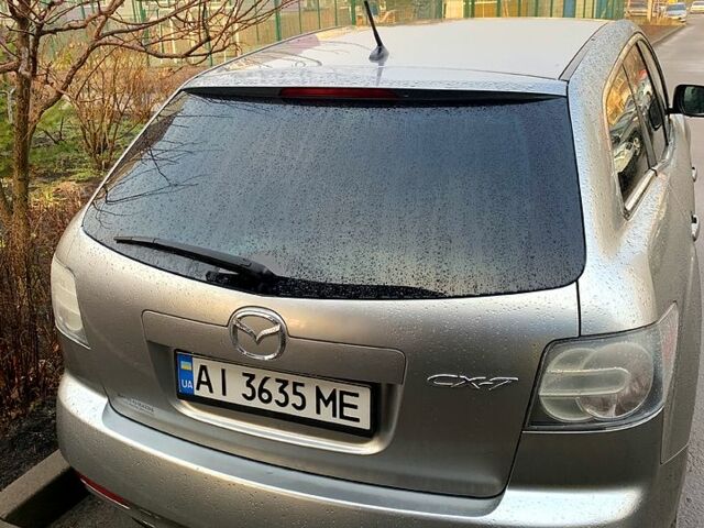 Серый Мазда СХ-7, объемом двигателя 25 л и пробегом 230 тыс. км за 9700 $, фото 1 на Automoto.ua