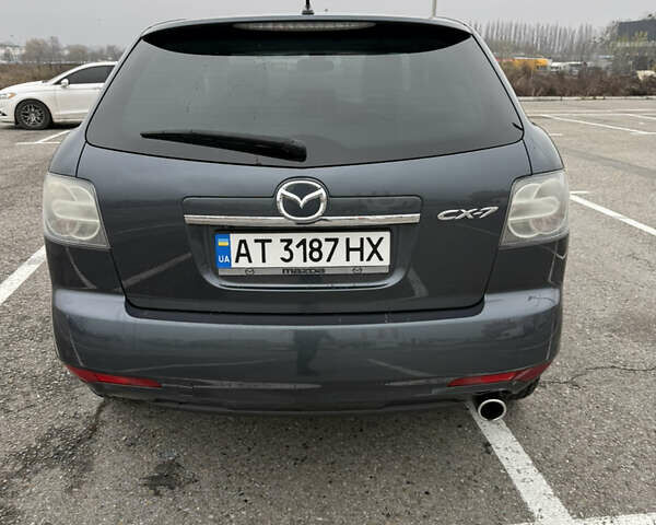 Серый Мазда СХ-7, объемом двигателя 2.2 л и пробегом 245 тыс. км за 9700 $, фото 10 на Automoto.ua