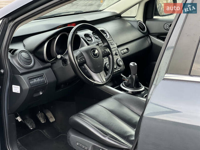 Серый Мазда СХ-7, объемом двигателя 2.18 л и пробегом 240 тыс. км за 11000 $, фото 7 на Automoto.ua