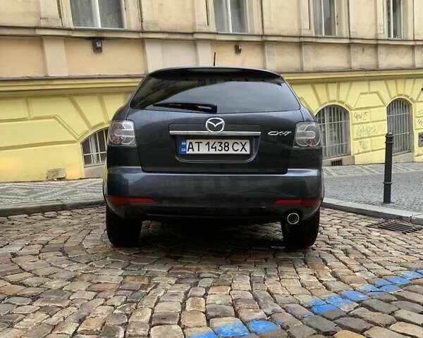 Серый Мазда СХ-7, объемом двигателя 2.2 л и пробегом 218 тыс. км за 11500 $, фото 4 на Automoto.ua