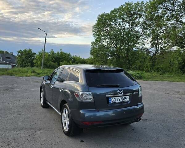 Сірий Мазда СХ-7, об'ємом двигуна 2.18 л та пробігом 259 тис. км за 10499 $, фото 23 на Automoto.ua