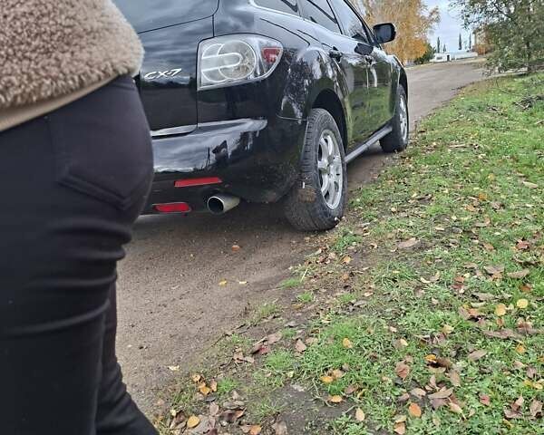 Мазда СХ-7 2007 в Кропивницком (Кировограде) на Automoto.ua Синий Мазда СХ-7, объемом двигателя 2.26 л и пробегом 207 тыс. км за 7000 $, фото 176 на Automoto.ua
