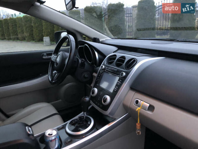 Синій Мазда СХ-7, об'ємом двигуна 2.3 л та пробігом 169 тис. км за 7800 $, фото 38 на Automoto.ua