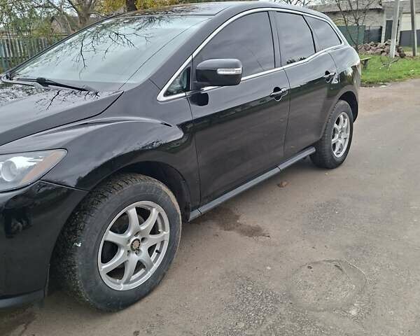 Мазда СХ-7 2007 в Кропивницком (Кировограде) на Automoto.ua Синий Мазда СХ-7, объемом двигателя 2.26 л и пробегом 207 тыс. км за 7000 $, фото 55 на Automoto.ua