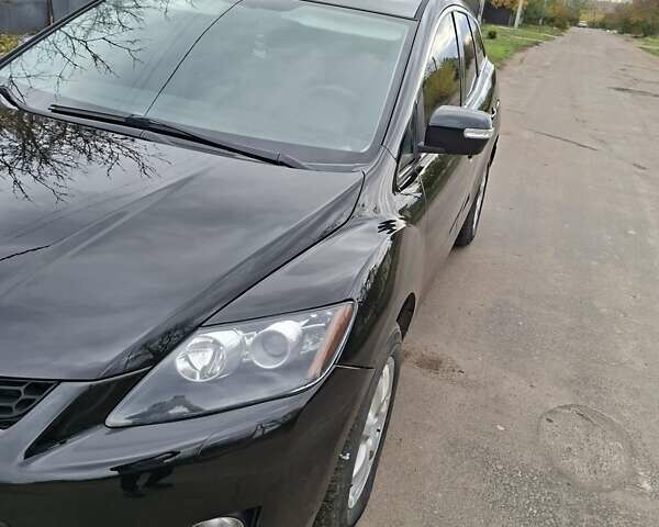 Мазда СХ-7 2007 в Кропивницком (Кировограде) на Automoto.ua Синий Мазда СХ-7, объемом двигателя 2.26 л и пробегом 207 тыс. км за 7000 $, фото 147 на Automoto.ua