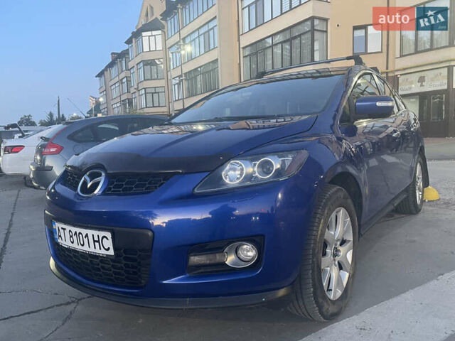 Синий Мазда СХ-7, объемом двигателя 2.26 л и пробегом 150 тыс. км за 7800 $, фото 36 на Automoto.ua