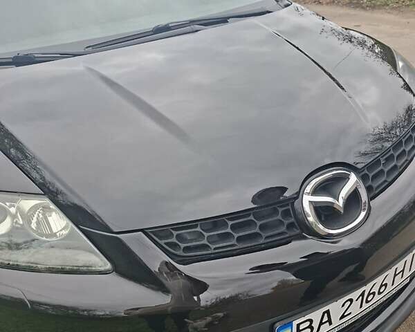 Мазда СХ-7 2007 в Кропивницком (Кировограде) на Automoto.ua Синий Мазда СХ-7, объемом двигателя 2.26 л и пробегом 207 тыс. км за 7000 $, фото 228 на Automoto.ua