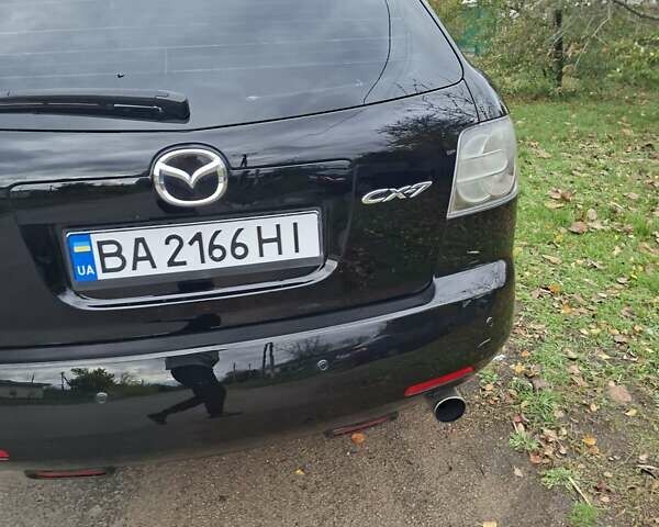 Мазда СХ-7 2007 в Кропивницком (Кировограде) на Automoto.ua Синий Мазда СХ-7, объемом двигателя 2.26 л и пробегом 207 тыс. км за 7000 $, фото 129 на Automoto.ua