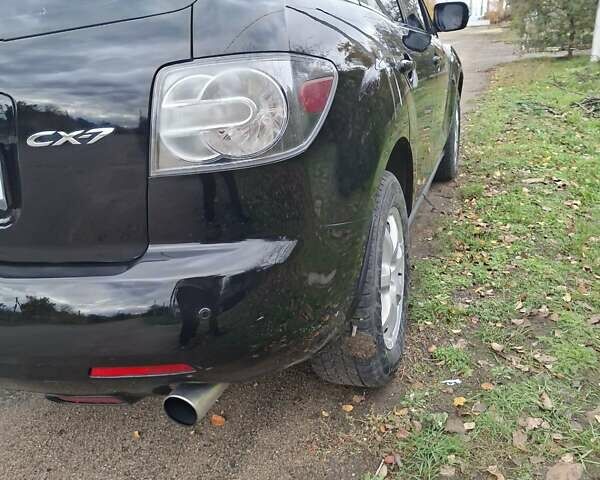 Мазда СХ-7 2007 в Кропивницком (Кировограде) на Automoto.ua Синий Мазда СХ-7, объемом двигателя 2.26 л и пробегом 207 тыс. км за 7000 $, фото 159 на Automoto.ua