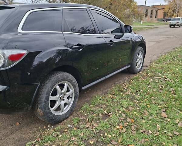 Мазда СХ-7 2007 в Кропивницком (Кировограде) на Automoto.ua Синий Мазда СХ-7, объемом двигателя 2.26 л и пробегом 207 тыс. км за 7000 $, фото 160 на Automoto.ua