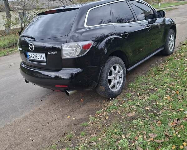 Мазда СХ-7 2007 в Кропивницком (Кировограде) на Automoto.ua Синий Мазда СХ-7, объемом двигателя 2.26 л и пробегом 207 тыс. км за 7000 $, фото 180 на Automoto.ua
