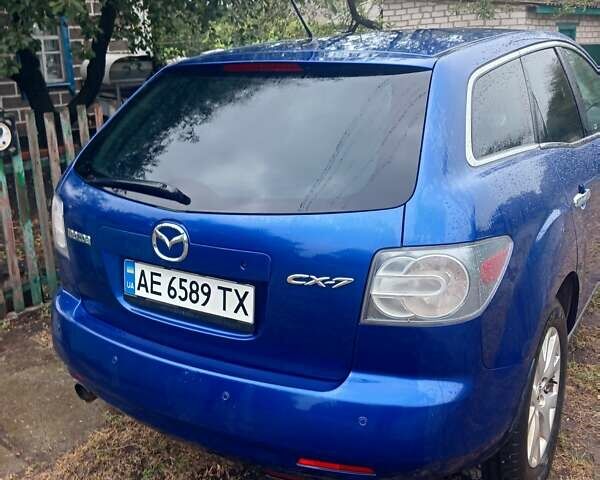 Синий Мазда СХ-7, объемом двигателя 2.3 л и пробегом 244 тыс. км за 6800 $, фото 1 на Automoto.ua