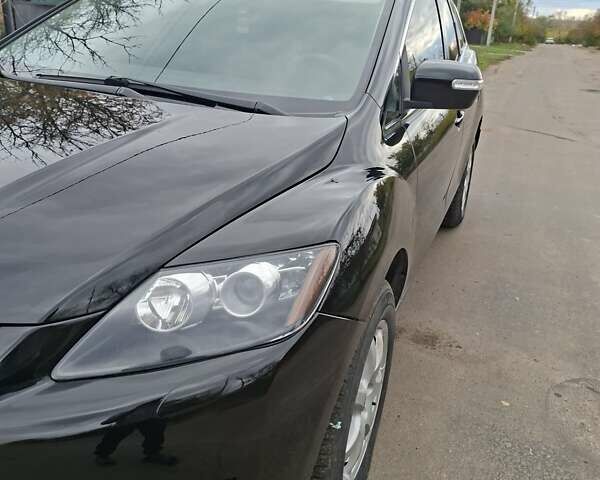 Мазда СХ-7 2007 в Кропивницком (Кировограде) на Automoto.ua Синий Мазда СХ-7, объемом двигателя 2.26 л и пробегом 207 тыс. км за 7000 $, фото 141 на Automoto.ua